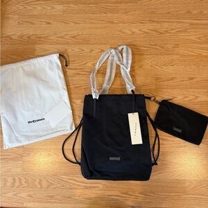 Spacious Black Tote Bag with Textured Design
